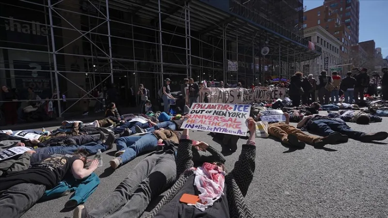 A protest outside the headquarters of Palantir, a company that produces AI-powered surveillance technologies for Israel, in the U.S.